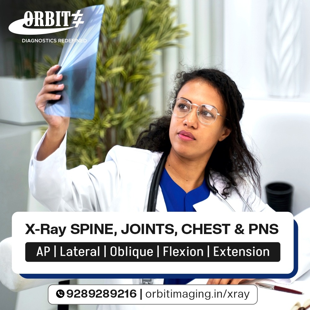 Female doctor looking at x-ray film